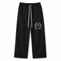 Model wearing the black DOMIN8NY Dragon straight-leg pants, video preview