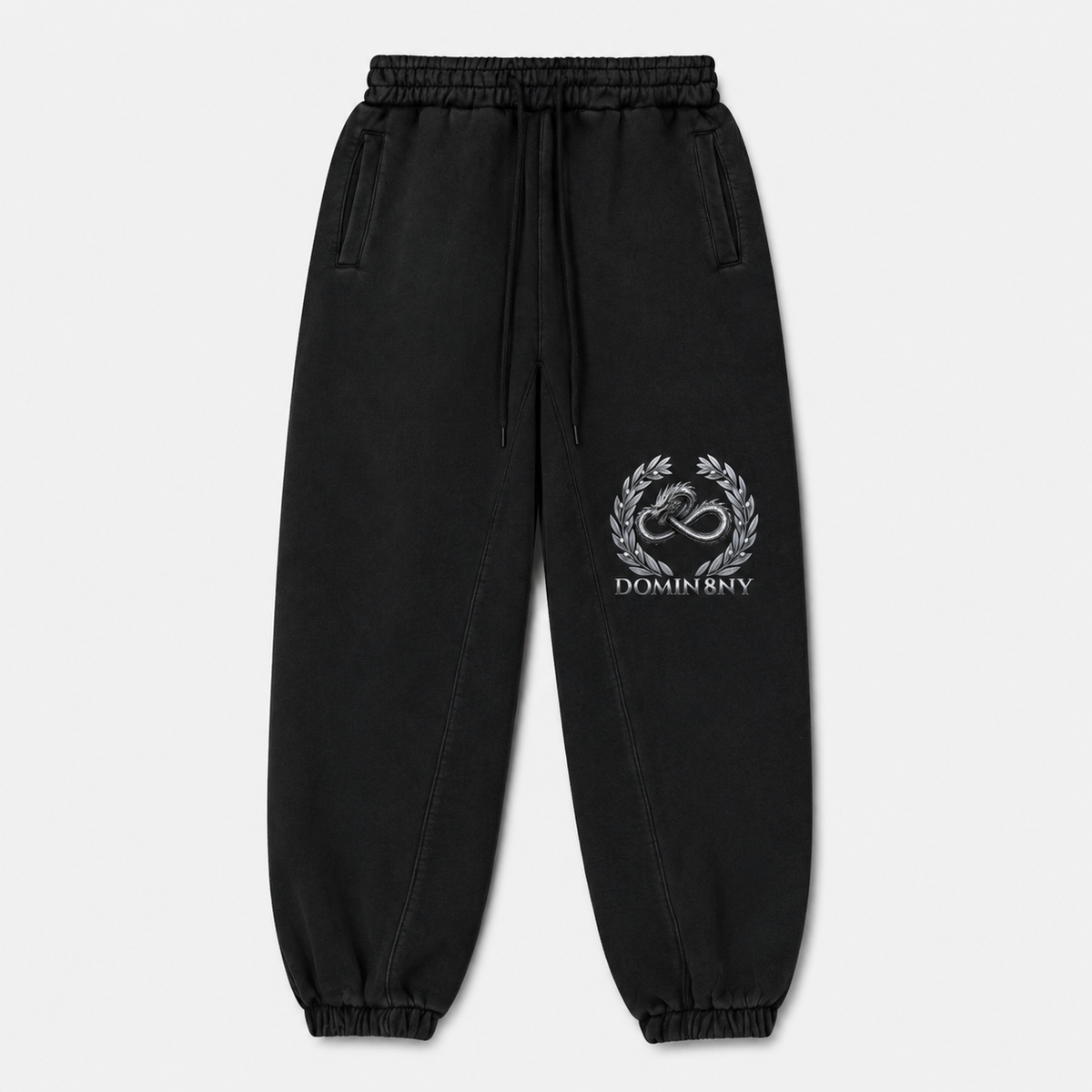 Model wearing the black DOMIN8NY Dragon fleece sweatpants, front view