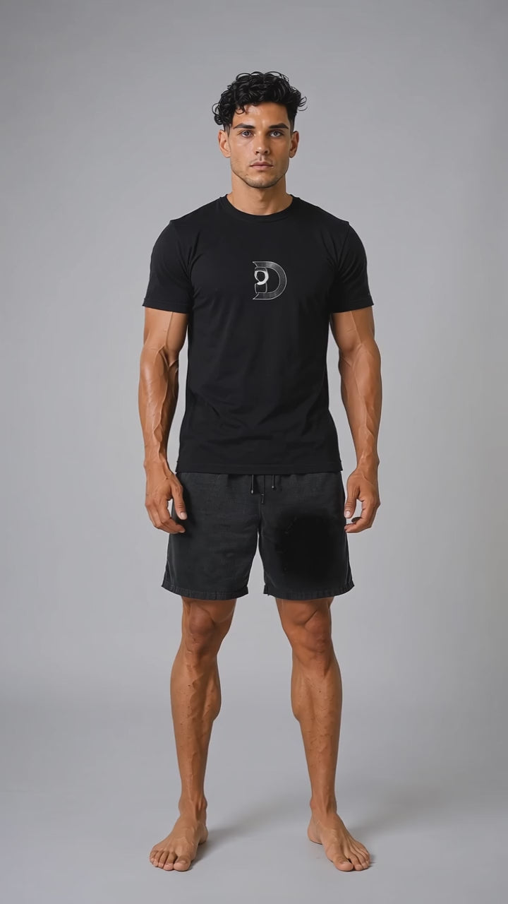 Model wearing the DOMIN8NY Crown graphic T-shirt, video preview