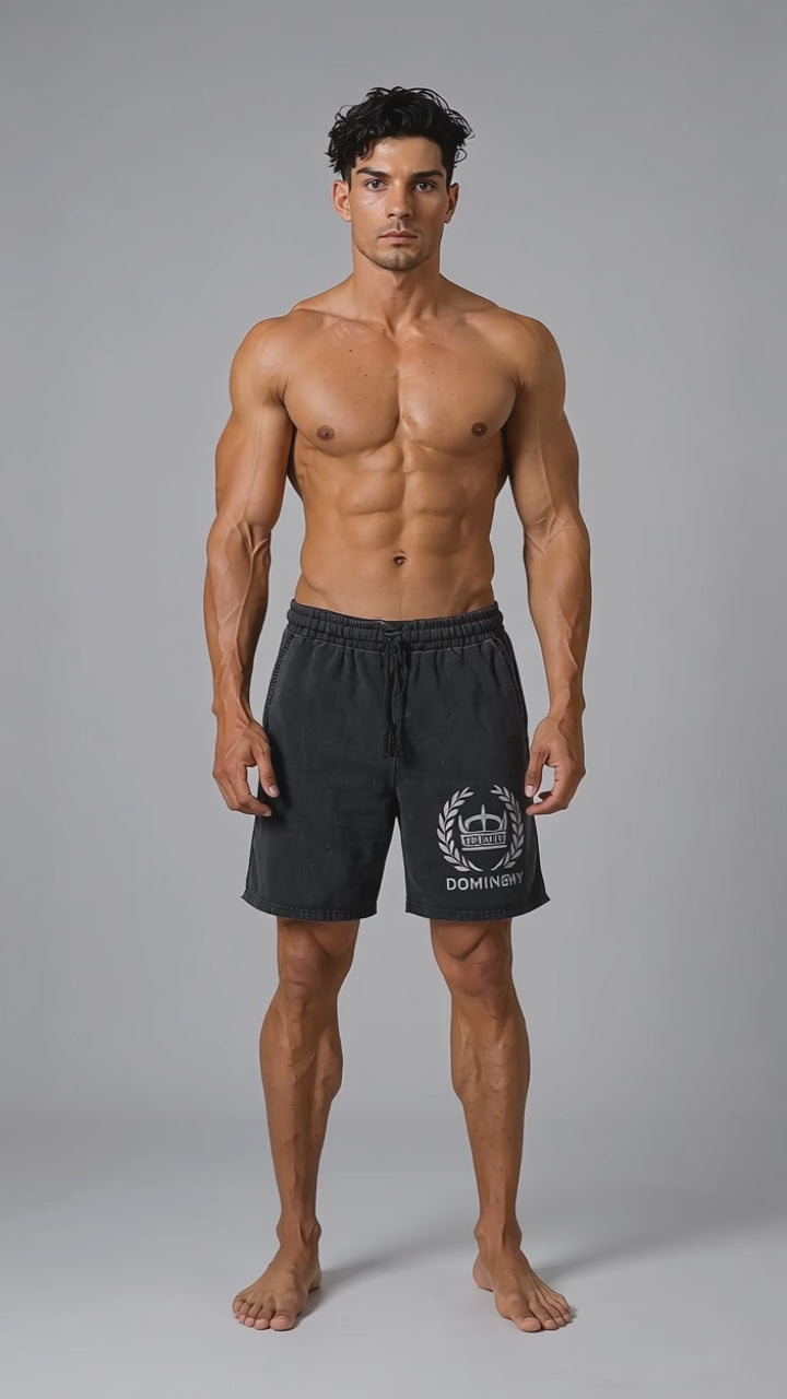 Model wearing the black DOMIN8NY Crown casual shorts, front view