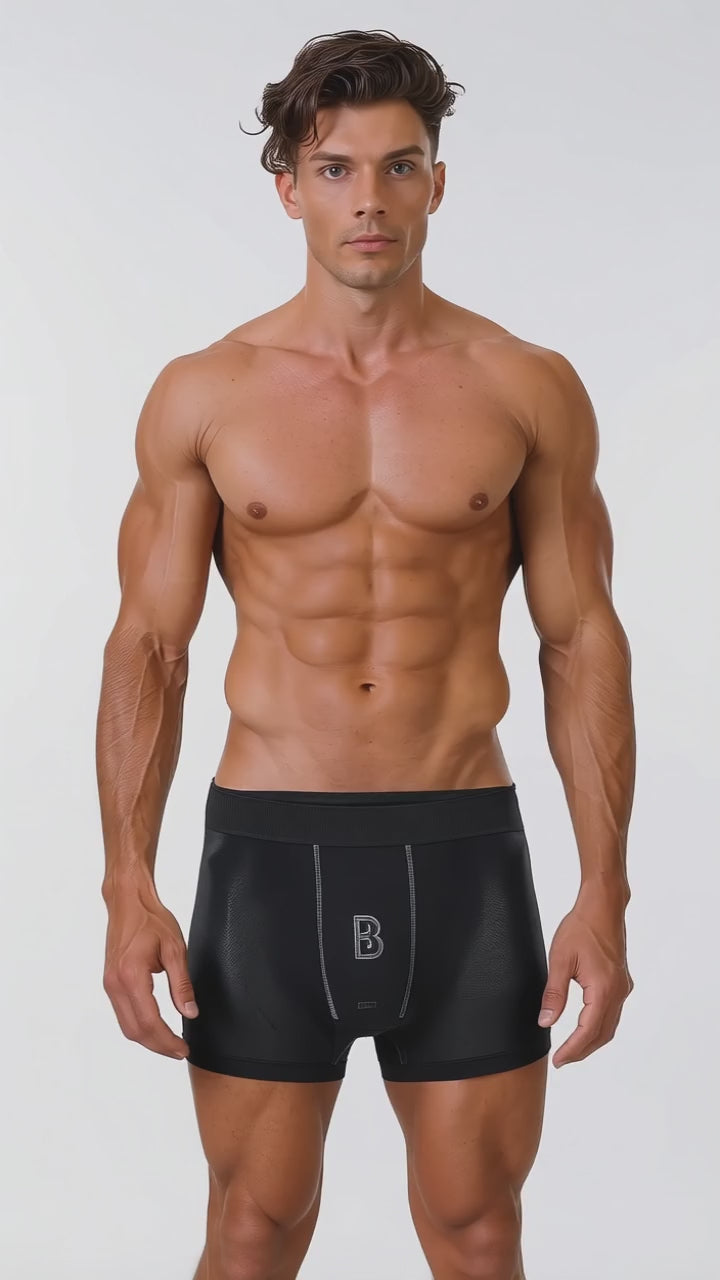 Model wearing the DOMIN8NY stretch boxer briefs, front view